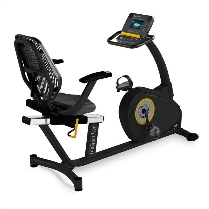 A black and yellow recumbent exercise bike.